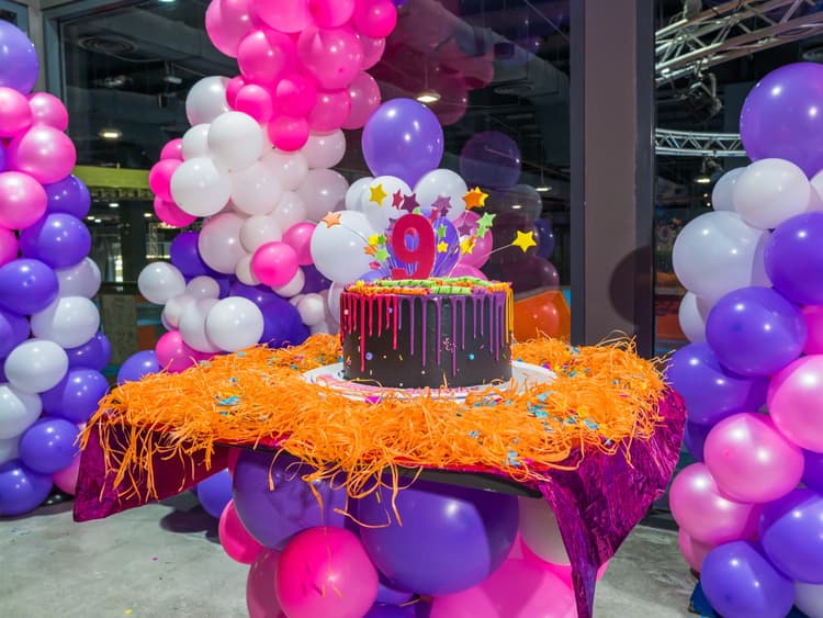 Birthday cake on a decorated party table