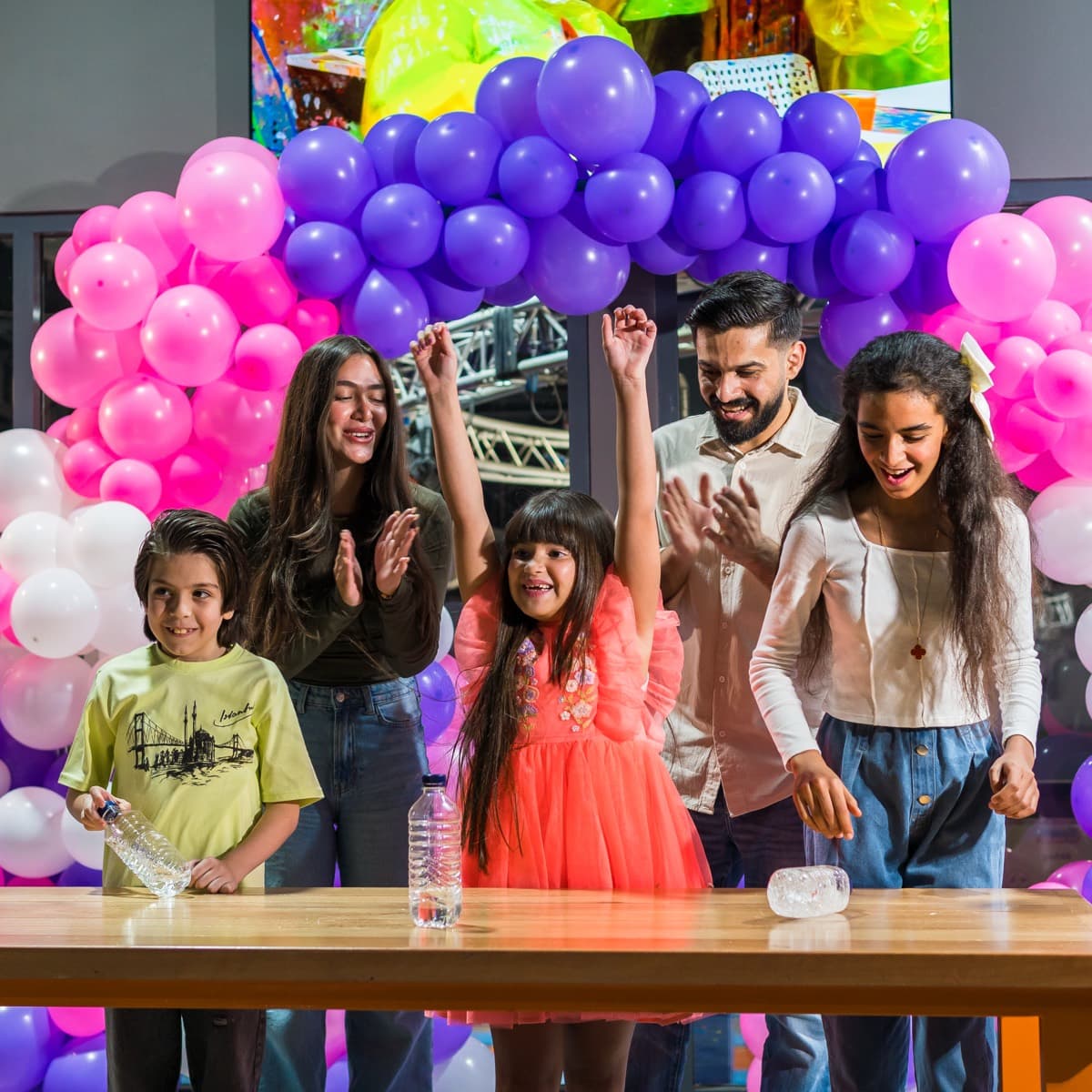 Birthday girl celebrating winning a party game