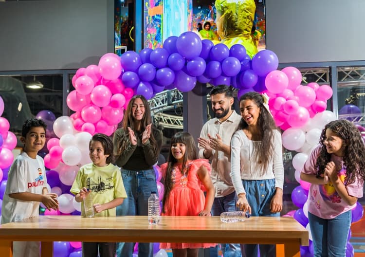 Kids laughing during a party game