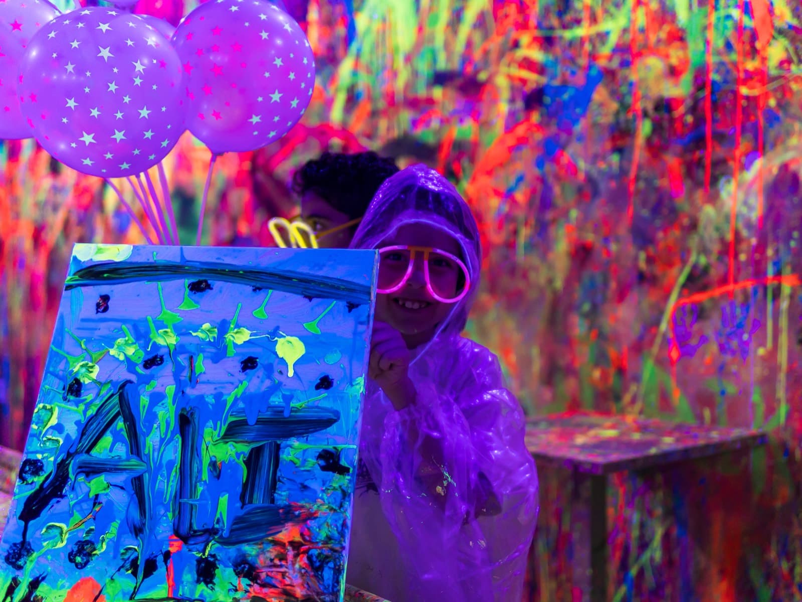 Child with a personalized glowing canvas